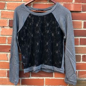 Black lace detail on grey top
